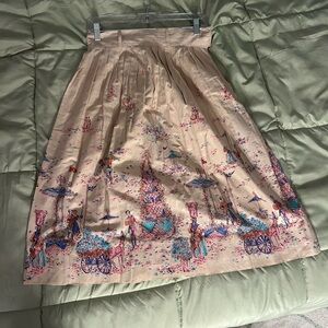 Elegant Beige Pleated Skirt with Colorful Print